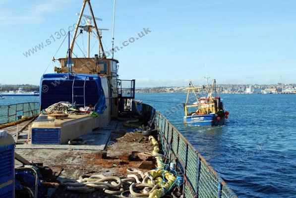 S130 Donor Boat - Arthur of San Lorenzo being towed past Devenport Dockyard